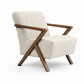 Poltrona soggiorno beige in poliestere bouclé con struttura in legno massello di noce sagomata 73 x 78 x 82 cm